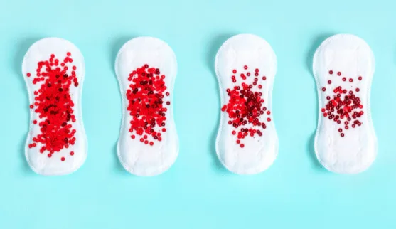 Šibek srednji ali močan menstrualni tok?